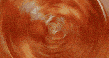 a close up of a person 's eye with a reflection
