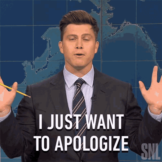 a man in a suit and tie says that he just wants to apologize