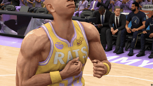a basketball player is wearing a yellow and purple jersey with the word rats on it