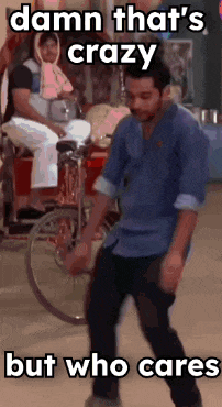 a man is dancing in front of a wheelchair with a caption that says `` damn that 's crazy but who cares ''