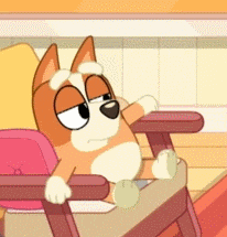 a cartoon dog is sitting in a chair with a sad face .