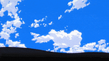 a blue sky with white clouds and a silhouette of a hill