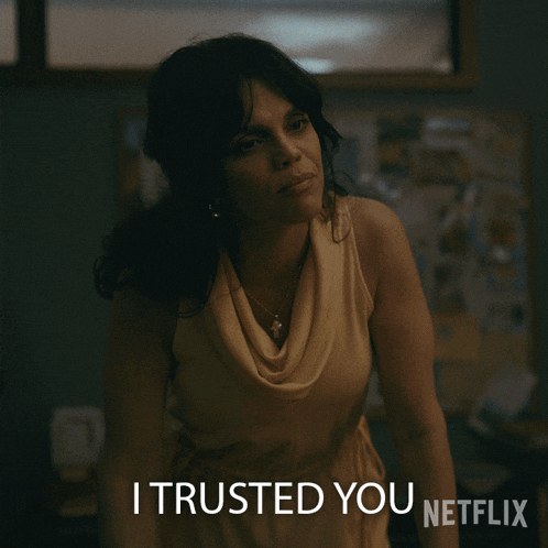 a woman in a yellow dress says i trusted you netflix on the bottom