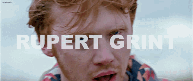 a close up of a man 's face with the name rupert grint on the bottom