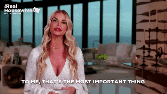a woman says " to me that 's the most important thing " in front of a living room