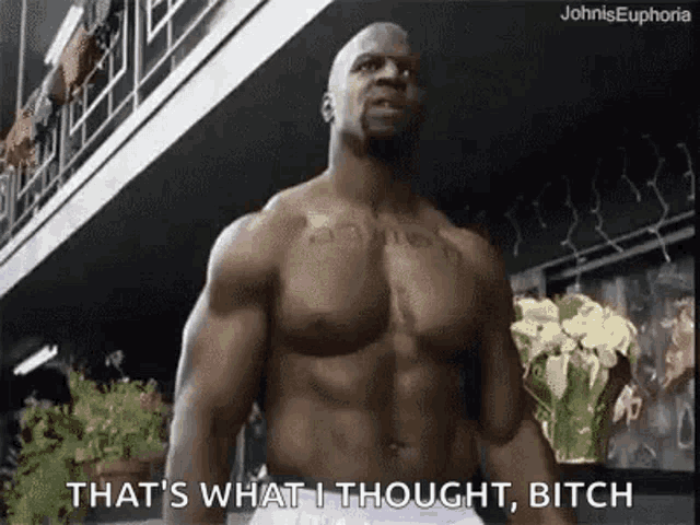 a shirtless man is standing in front of a balcony and saying `` that 's what i thought bitch '' .