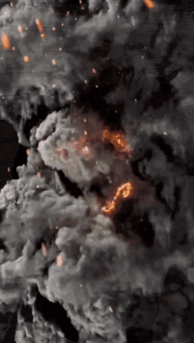 smoke and fire are coming out of the ground