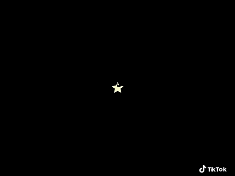 a yellow star on a black background with tiktok written in the corner