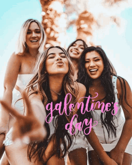 four women are posing for a picture with the words galentine 's day written in pink