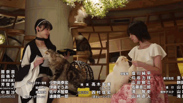 two women standing next to each other with chinese writing on the bottom left