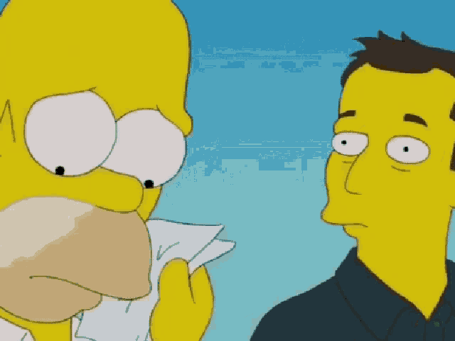 homer simpson is crying and holding a piece of paper in his hand
