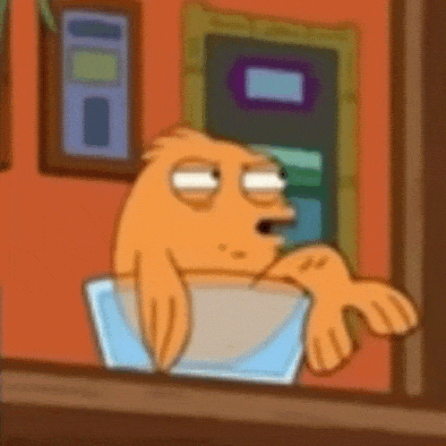 a cartoon character is sitting in a glass bowl and looking out the window .