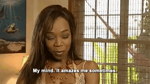 a woman is standing in front of a window and says " my mind it amazes me sometimes "