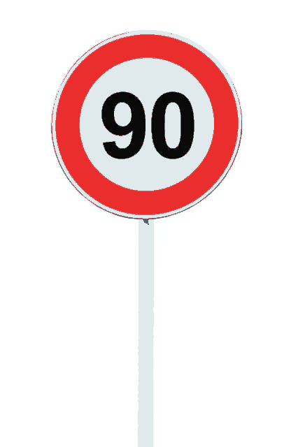 a red and white speed limit sign with the number 90