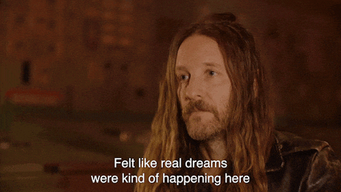 a man with long hair and a beard is talking about his dreams