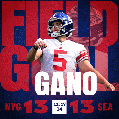 a poster for a football game between the giants and seahawks