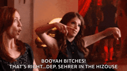 two women are standing next to each other and one says booyah bitches that 's right dep sehrer in the hizouse