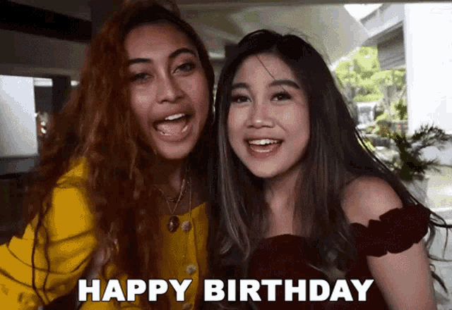 two women are standing next to each other with the words happy birthday written in the corner
