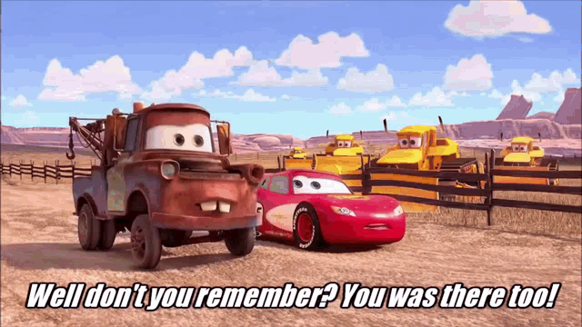 a tow truck and lightning mcqueen from the movie cars are standing next to each other in a desert