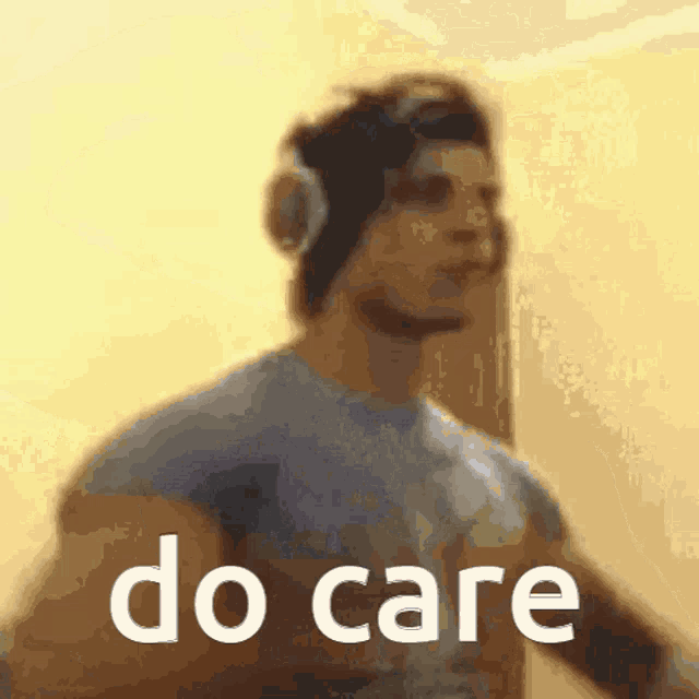 a blurry picture of a man with headphones and the words do care