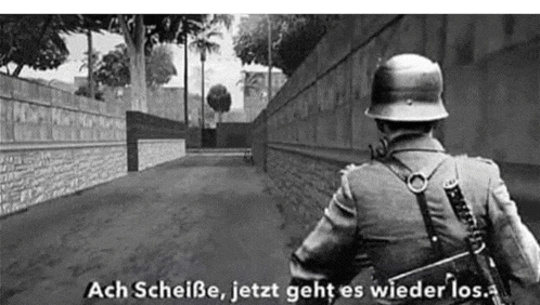 a black and white photo of a soldier with the words ach scheiße jetzt geht es wieder los .