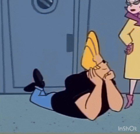 a cartoon character is laying on the ground with his head in his hands while a woman stands behind him .