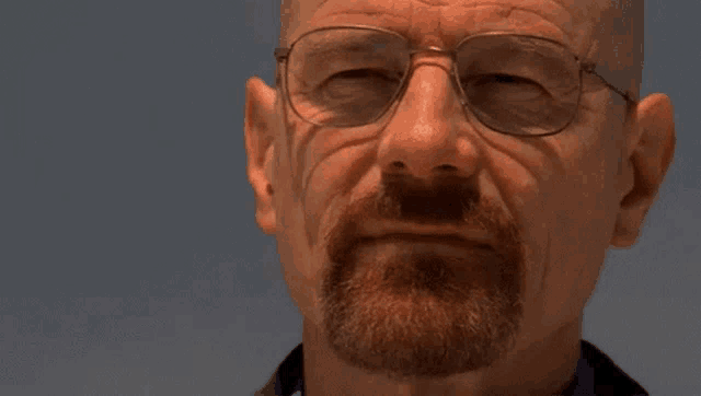 a man with glasses says you 're god
