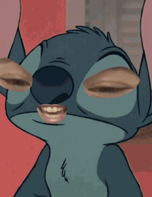 a close up of stitch 's face with his eyes closed and mouth open