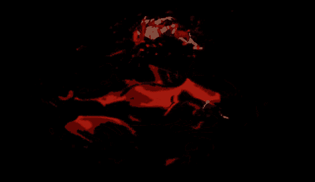 a person is falling into a pool of red liquid