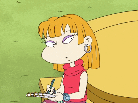 a cartoon girl is writing in a notebook