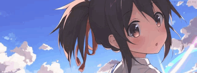 a girl with a ponytail is looking at the sky