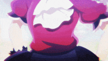 a close up of a person 's torso with a pink top and white ruffles