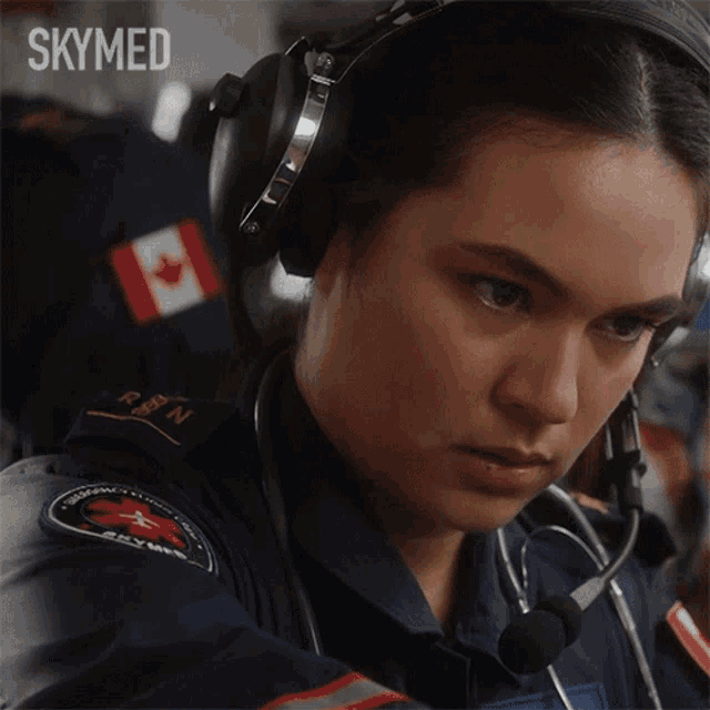 a woman wearing headphones and a stethoscope with the word skymed on the bottom left
