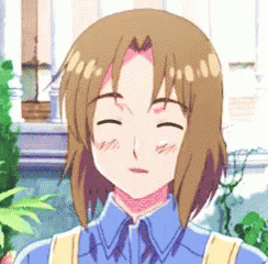 a cartoon character with brown hair and a blue shirt