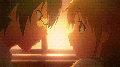 a boy and a girl are looking at each other with the sun shining behind them
