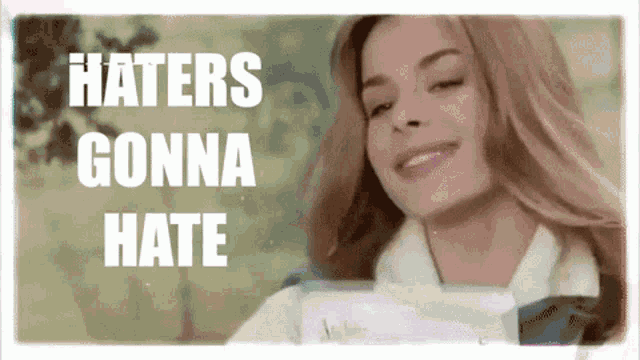 a woman says haters gonna hate while smiling