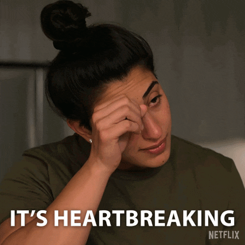 a woman wipes her nose with her hand and says it 's heartbreaking netflix