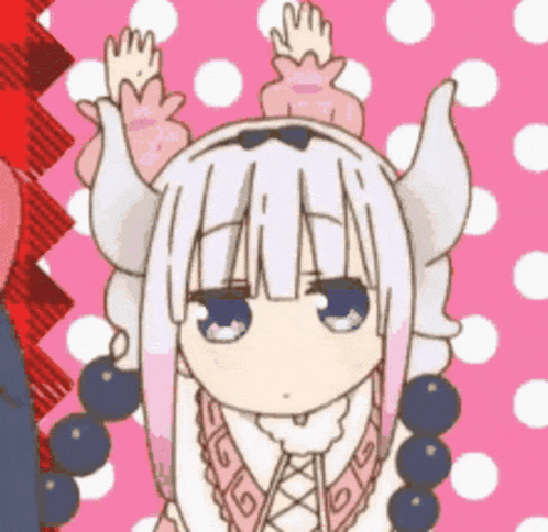 a close up of a cartoon girl with horns on her head .
