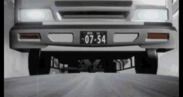 a white truck with a license plate that says 07-54