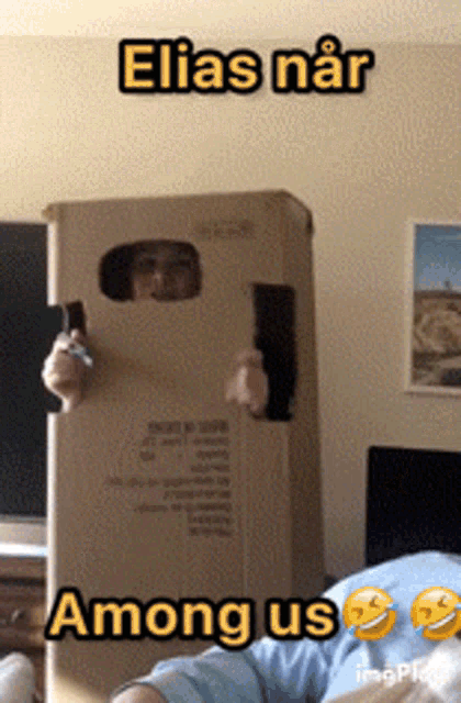 a picture of a person in a cardboard box with elias near among us written on it