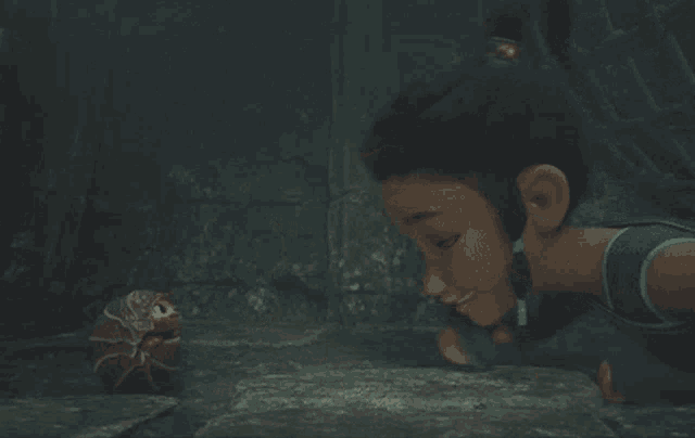 a cartoon girl is looking at a sea shell