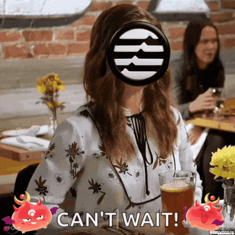 a woman is sitting at a table with a can 't wait sign