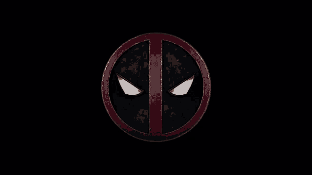 a close up of wolverine 's claws breaking through a shield