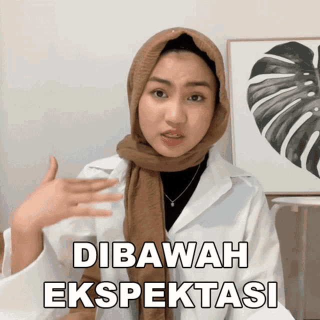 a woman wearing a hijab and a white coat says " dibawah ekspektasi "