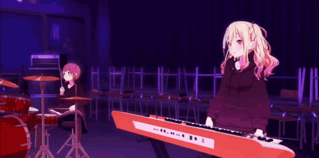 a girl with a target on her head is standing next to a girl playing a keyboard