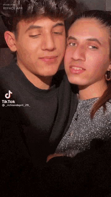 a man and a woman are posing for a picture with tiktok written on the bottom right