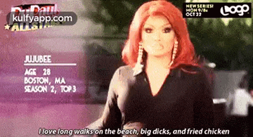a woman with red hair is standing on a beach and says i love long walks on the beach