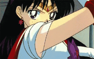 a close up of a girl 's arm with a purple ribbon around it