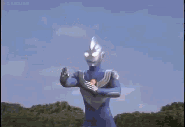a man in a purple suit is standing with his arms outstretched and a lightning bolt coming out of his chest .