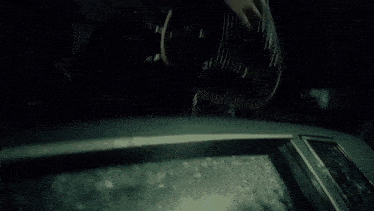 a close up of a car with spikes on the side
